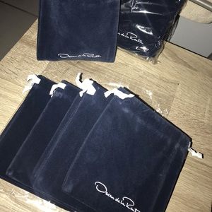Oscar de la Renta jewelry pouches